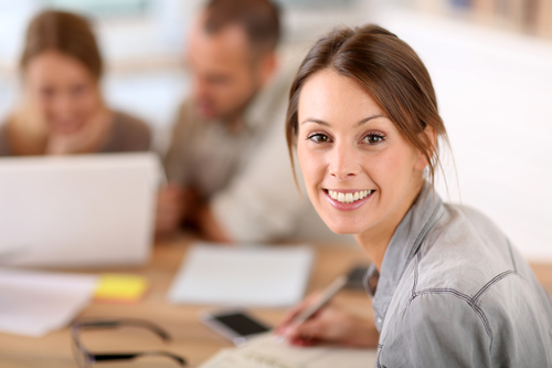 Young woman attending business training class